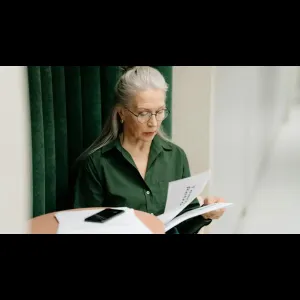 Person Reading Documents